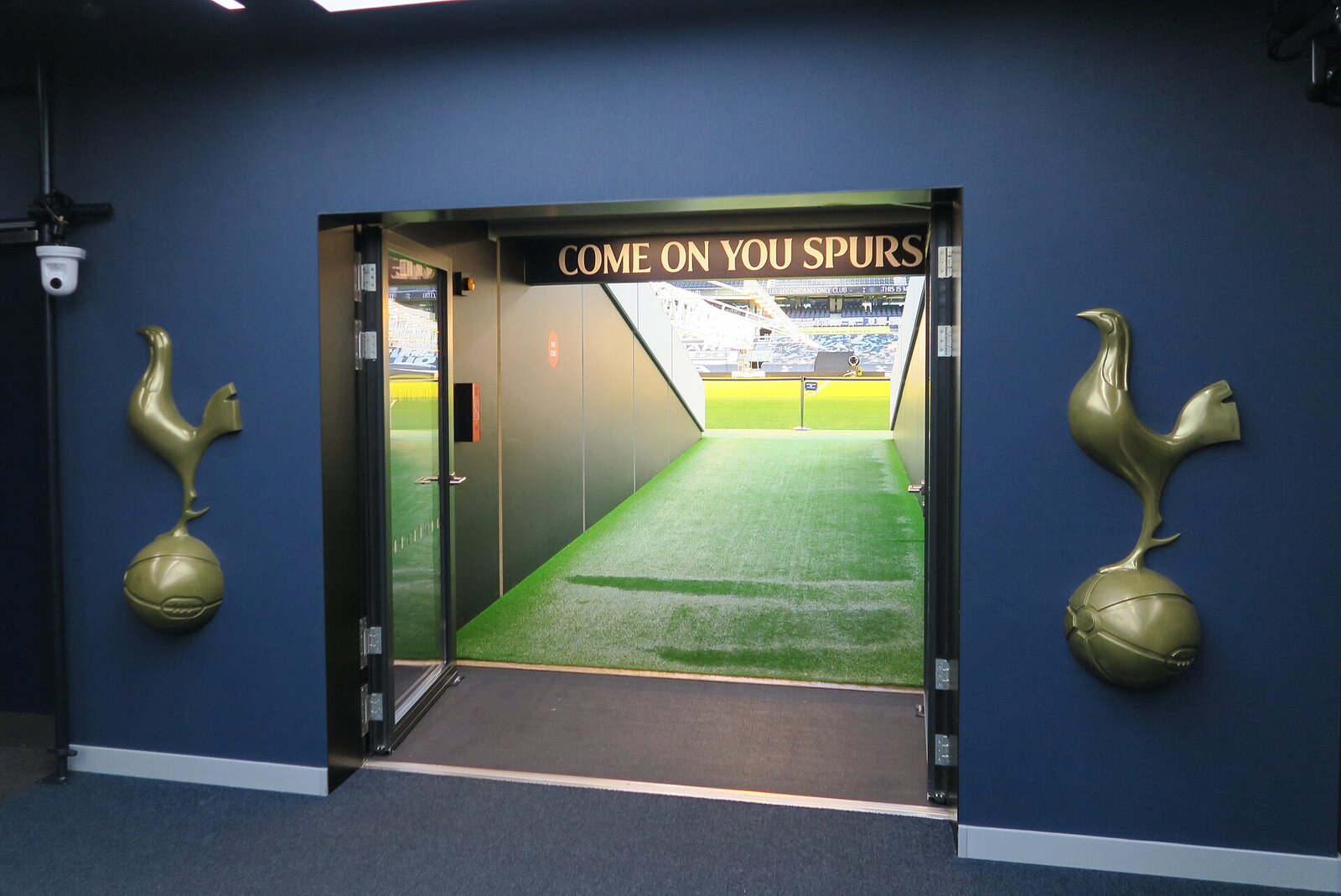 The players' tunnel at Tottenham Hotspur Stadium looking towards the pitch